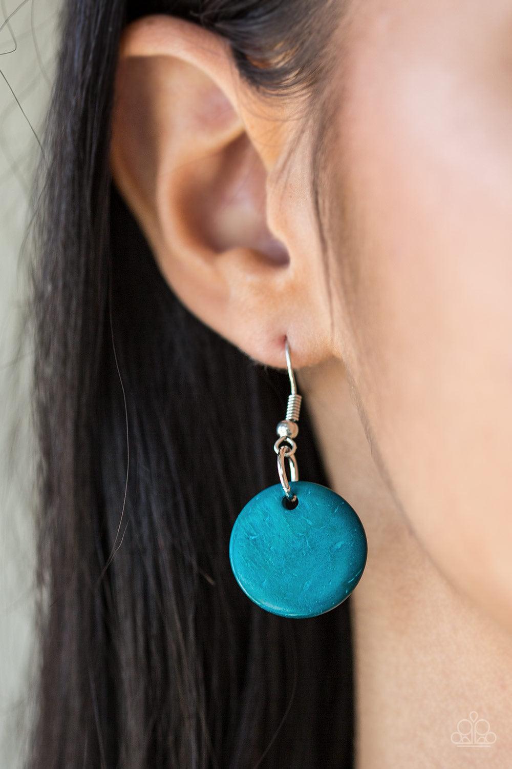 Paparazzi Accessories Catalina Coastin - Blue Brushed in a shell-like iridescence, refreshing blue wooden discs and round brown wooden beads are knotted along three strands of brown cording for a summery look. Features a button loop closure. Jewelry