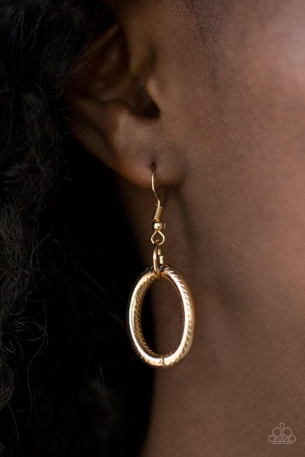 Paparazzi Accessories Boldly Bronx - Gold Featuring mismatched textures, bold gold links connect below the collar for a dramatic industrial look. Features an adjustable clasp closure. Sold as one individual necklace. Includes one pair of matching earrings