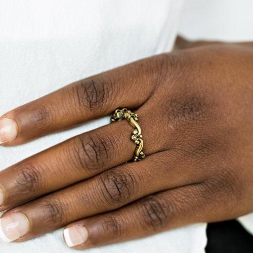 Paparazzi Accessories Serenely Summer - Brass Floral brass filigree dances across the finger, creating a dainty band. Features a dainty stretchy band for a flexible fit. Jewelry