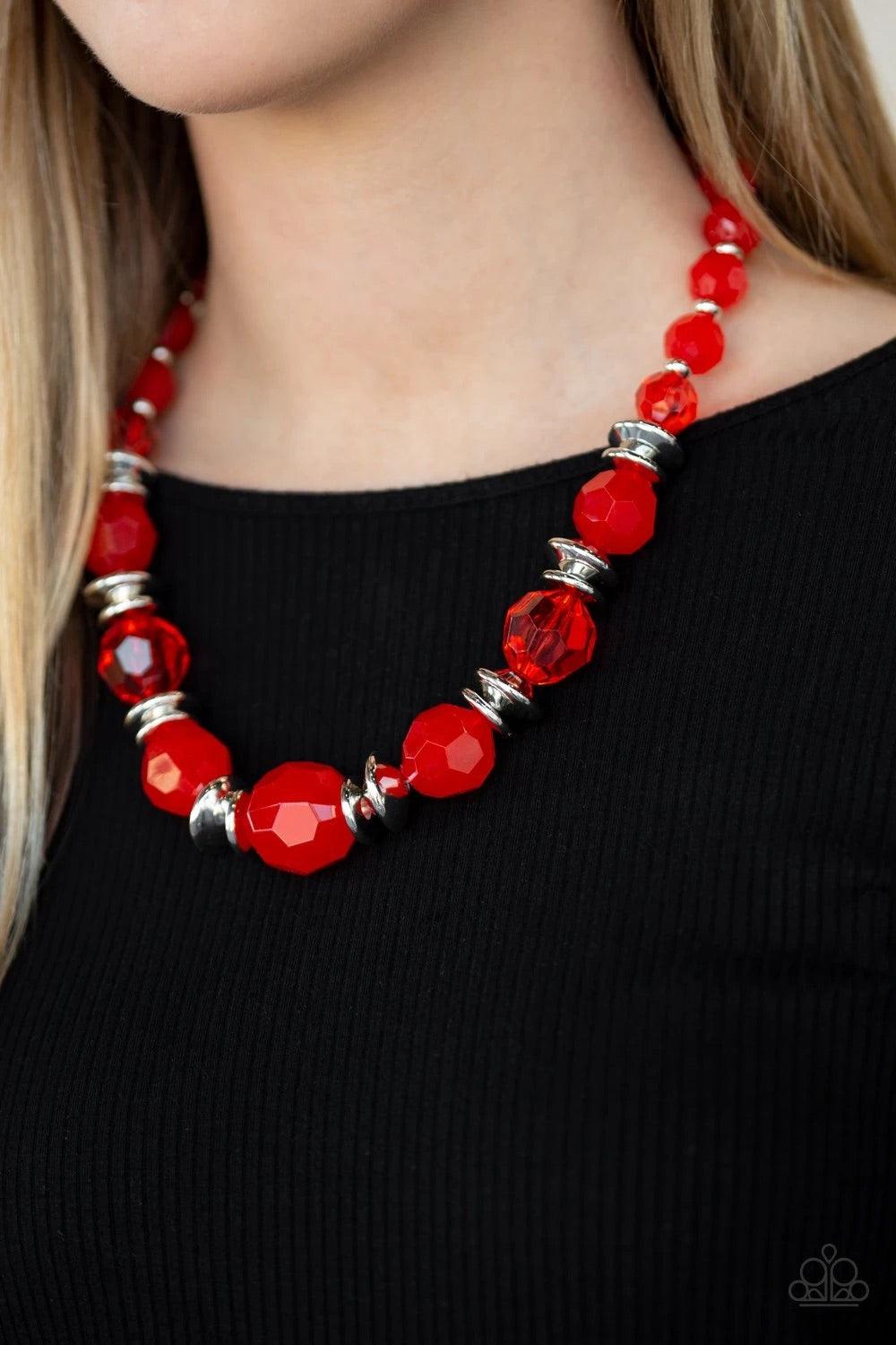 Paparazzi Accessories Dine and Dash - Red Infused with shimmery silver accents, faceted red beads gradually increase in size as they join below the collar for a fiery springtime look. Features an adjustable clasp closure. Sold as one individual necklace.