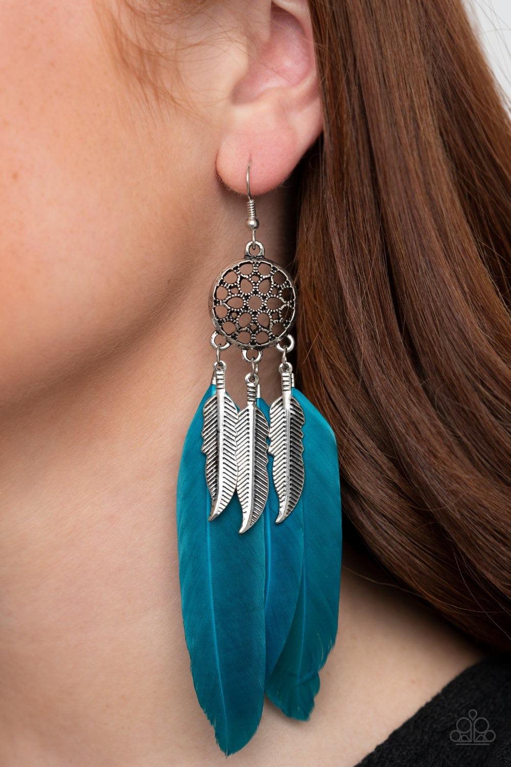 Paparazzi Accessories In Your Wildest DREAM-CATCHERS - Blue Vibrant blue feathers and antiqued silver feather charms swing from the bottom of an ornate silver frame, creating a wildly colorful dream-catcher. Earring attaches to a standard fishhook fitting
