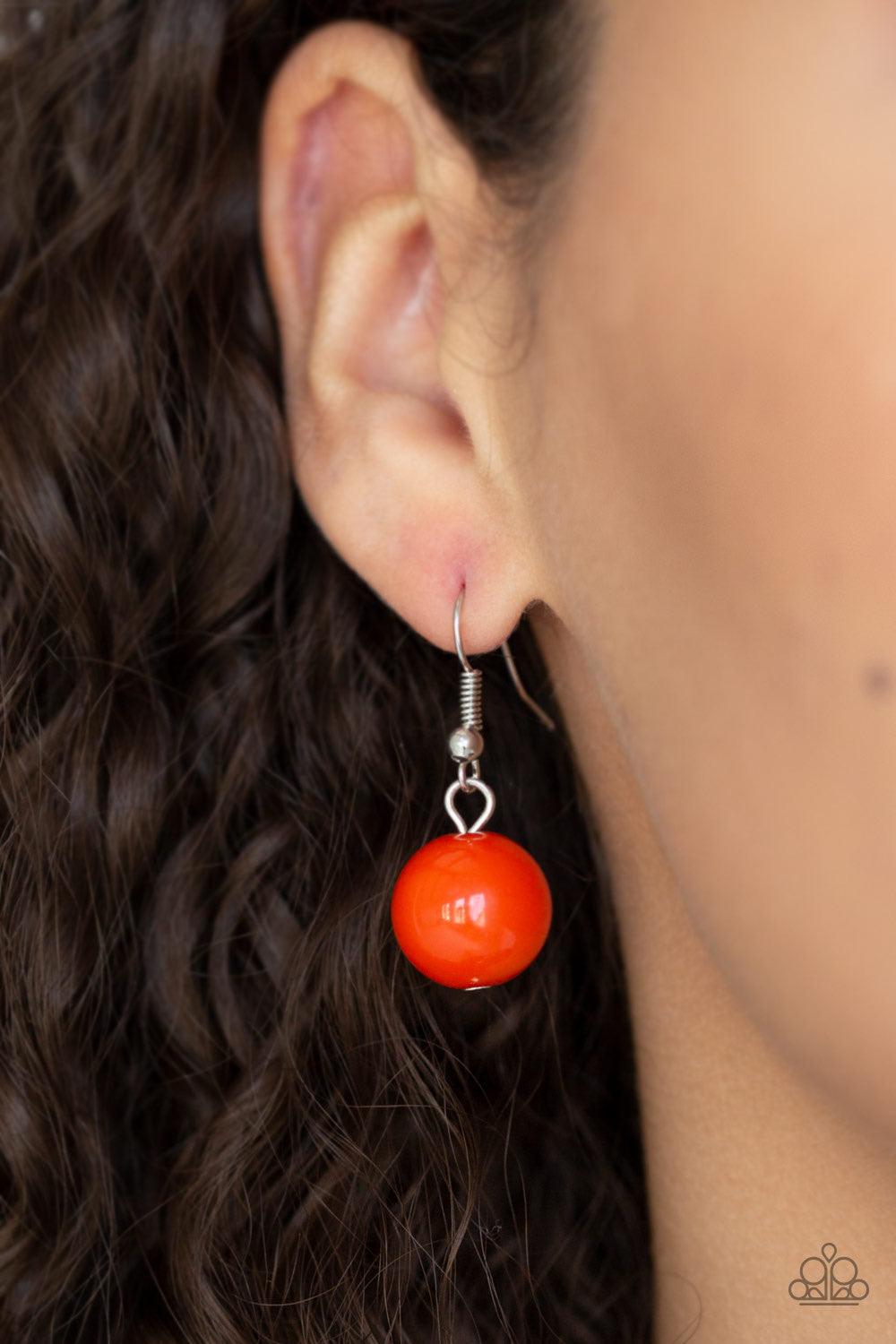 Paparazzi Accessories Floral Fusion - Orange Infused with dainty silver accents, a bubbly collection of hearty orange beads and floral embossed silver beads are threaded along an invisible wire below the collar for a seasonal look. Features an adjustable