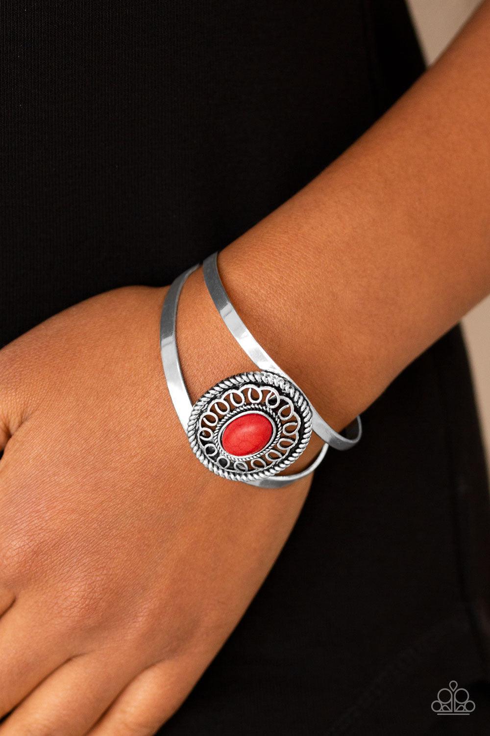 Paparazzi Accessories Deep In The TUMBLEWEEDS - Red Featuring a fiery red stone center, an ornate silver frame sits atop an airy silver cuff for a seasonal look. Sold as one individual bracelet. Jewelry