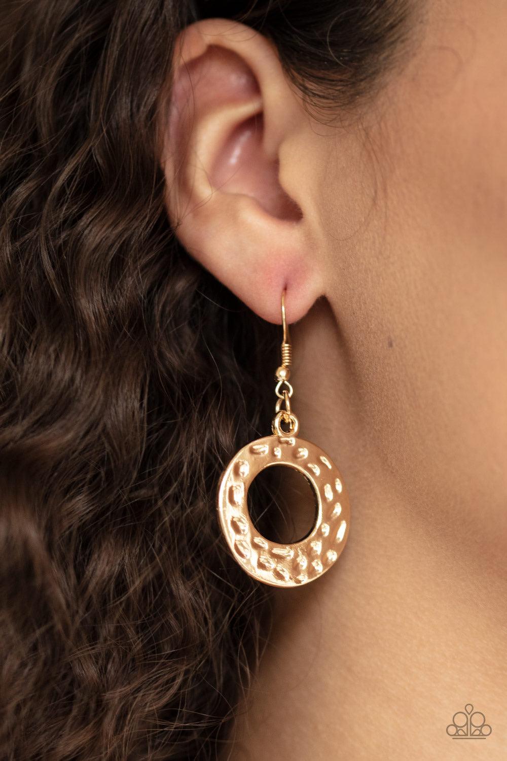 Paparazzi Accessories Mildly Metro - Gold Gradually increasing in size, hammered gold circles link below the collar for a statement-making look. Features an adjustable clasp closure. Jewelry