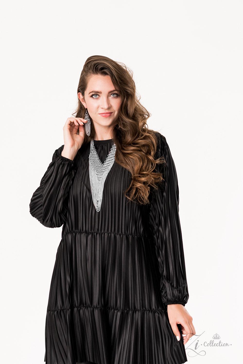Paparazzi Accessories Defiant 💗💗ZiCollection $25💗💗 Suspended from the bottom of thickly layered chains, a rebellious mesh of silver links connect into an edgy V-shaped net. Tiers of dainty silver chains drape from the bottom of the net, creating radic