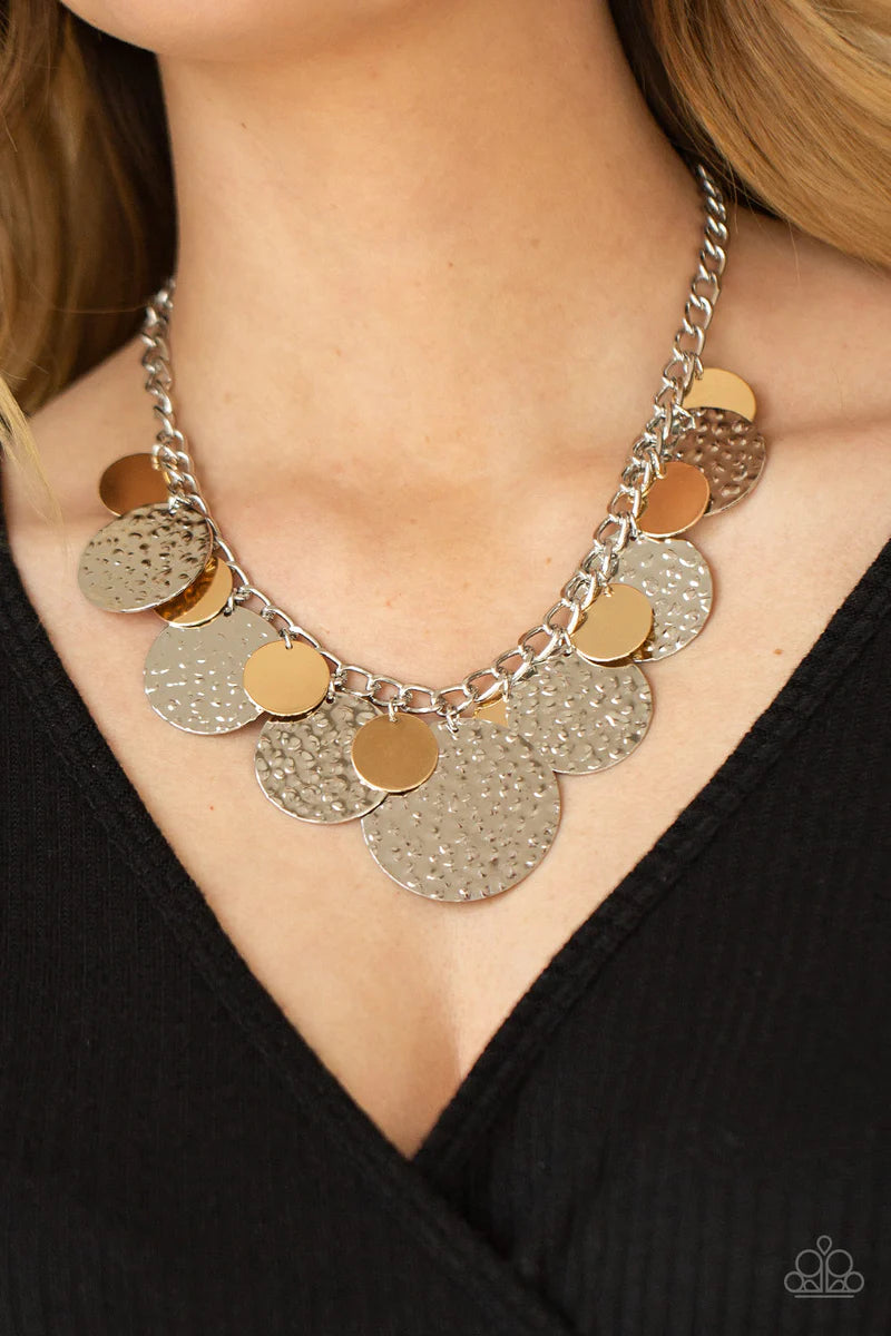 Paparazzi Accessories Industrial Grade Glamour - Silver Oversized gold discs and hammered silver discs swing from the bottom of a chunky silver chain, creating a rambunctious fringe below the collar. Features an adjustable clasp closure. Sold as one indiv