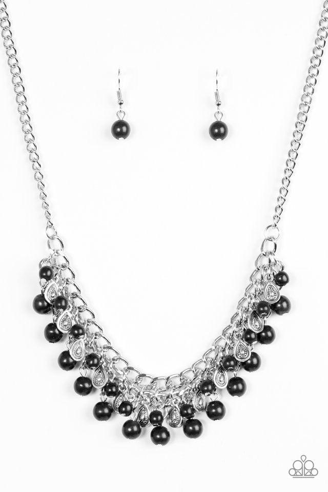 Paparazzi Accessories Poshly Paleo - Black Earthy black stone beading cascades from the bottom of interlocking silver chains, creating an earthy fringe below the collar. Brushed in an antiqued shimmer, textured silver teardrops drip between the colorful b