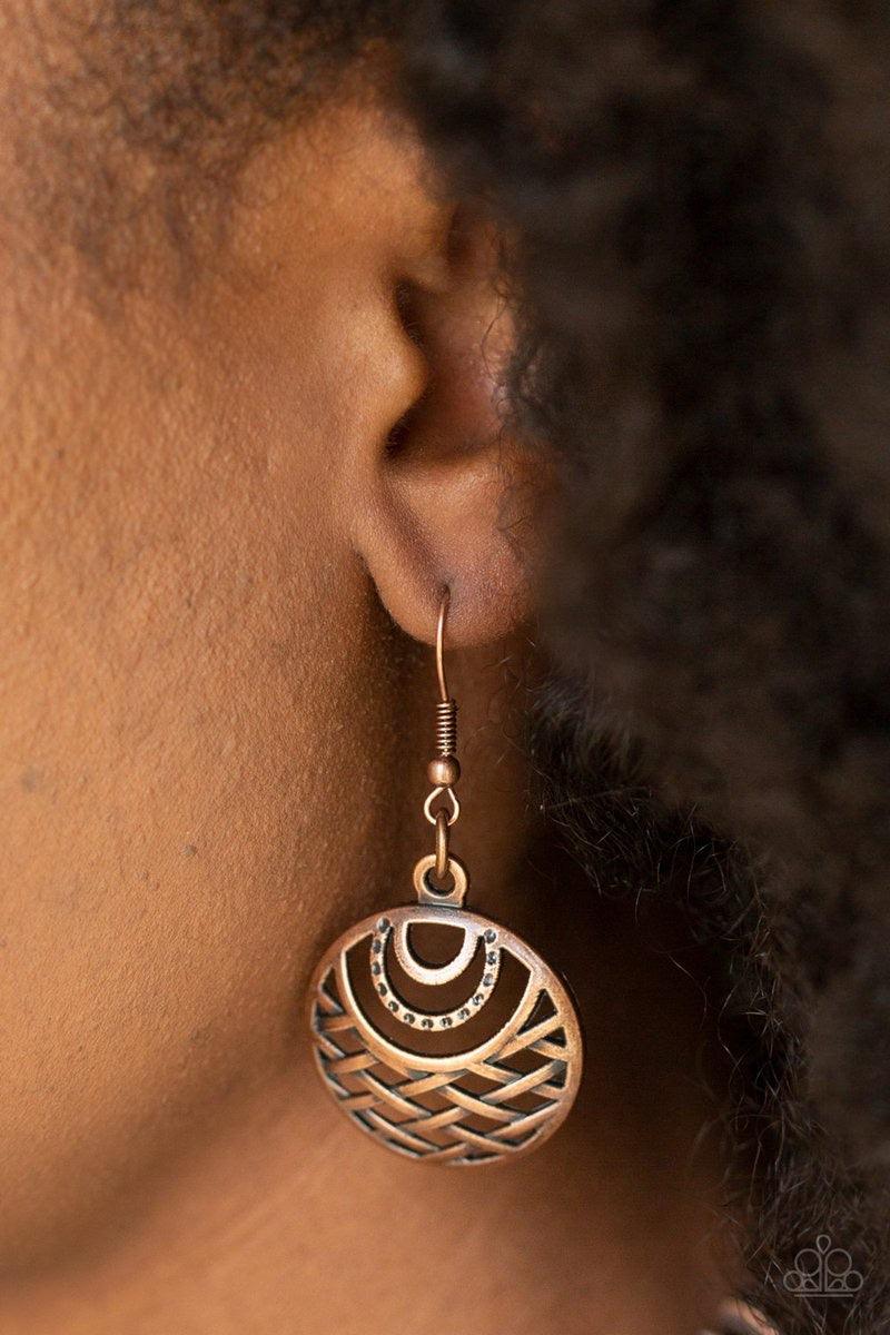 Paparazzi Accessories On The MANE Stage - Copper Featuring crisscrossed detail, dainty copper frames link below the collar, giving way to a dramatic half-moon plate radiating with airy tribal details for a fierce look. Features an adjustable clasp closure