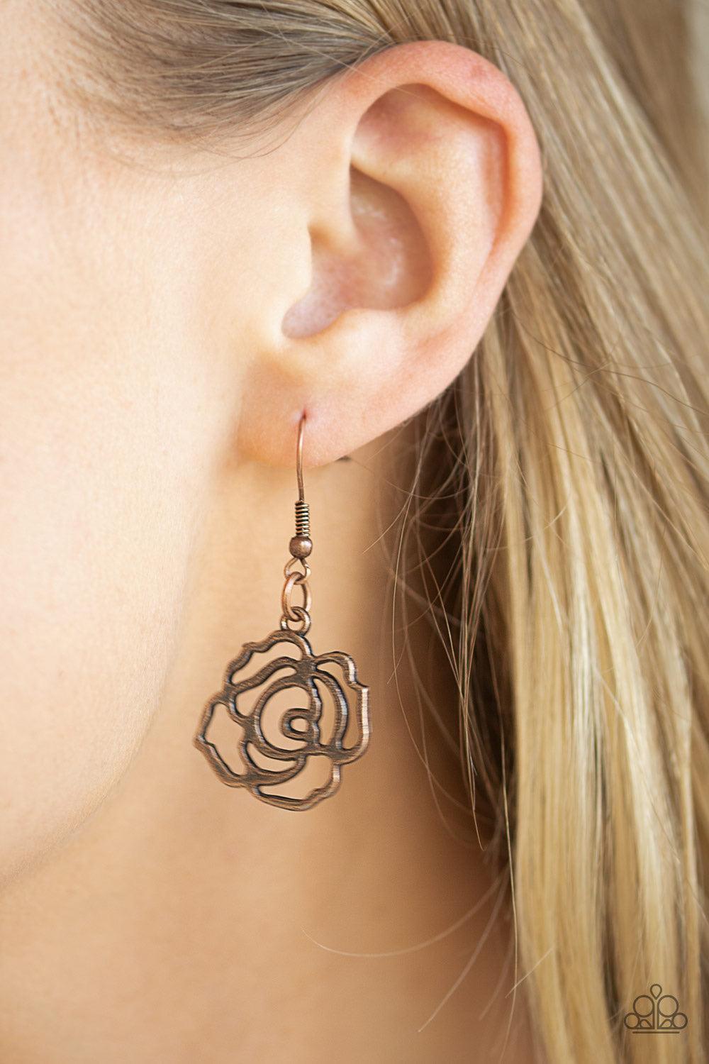 Paparazzi Accessories Budding Beauty - Copper Brushed in an antiqued finish, stenciled copper rosebuds link below the collar for a seasonal fashion. Features an adjustable clasp closure. Sold as one individual necklace. Includes one pair of matching earri