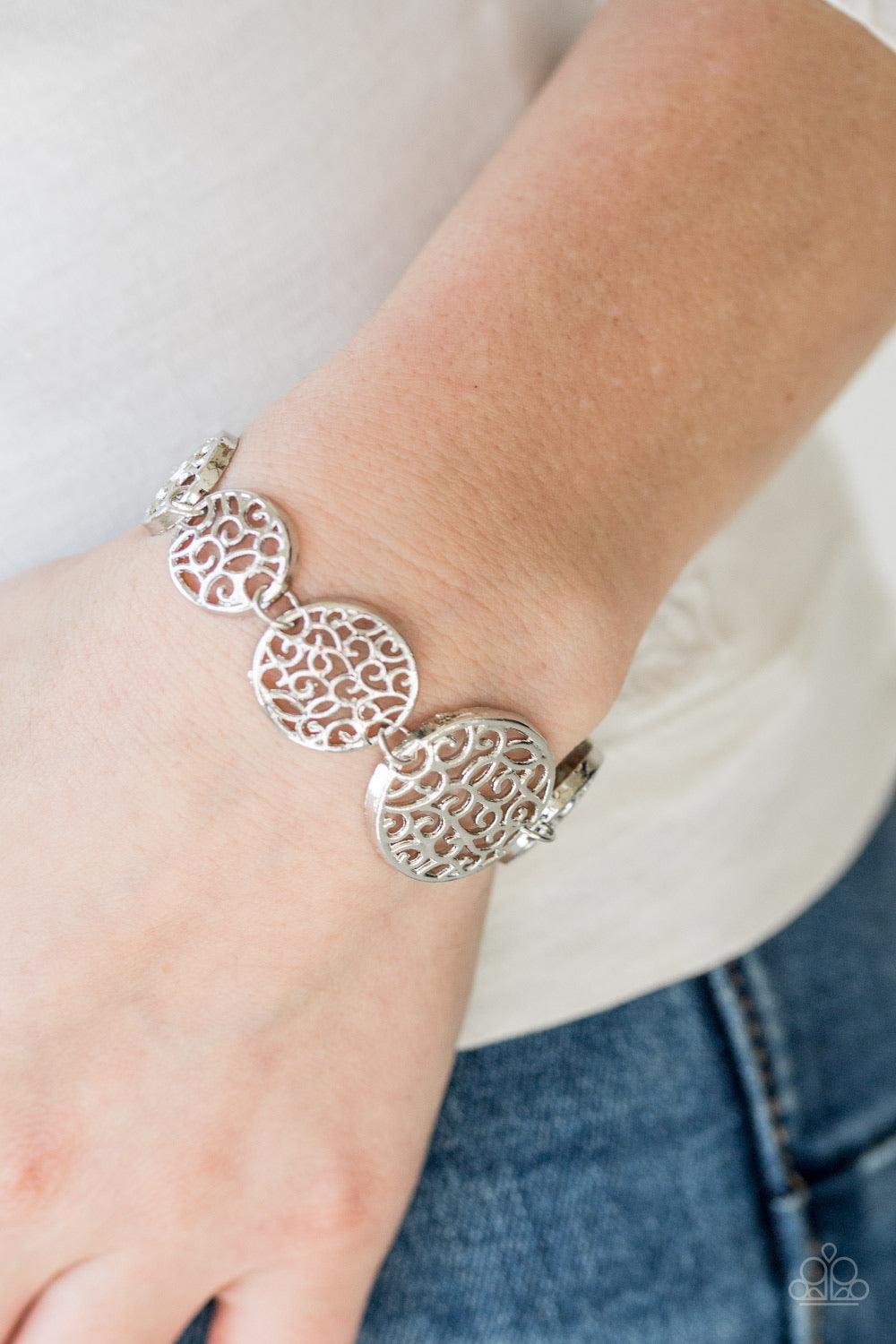 Paparazzi Accessories Dream WHIRL - Silver Filled with whirling filigree centers, shiny silver frames link around the wrist for a whimsical look. Features an adjustable clasp closure. Sold as one individual bracelet. Jewelry
