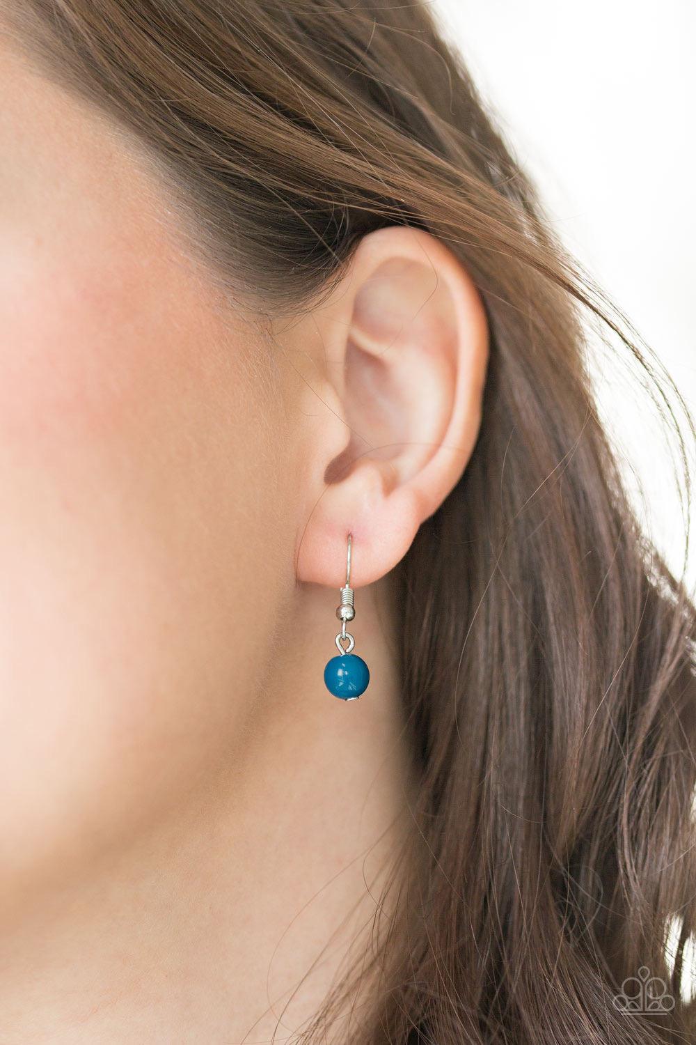 Paparazzi Accessories Voyager Vibes ~Blue Featuring smooth and studded silver frames, refreshing blue beads link below the collar in a seasonal fashion. Features an adjustable clasp closure. Sold as one individual necklace. Includes one pair of matching e
