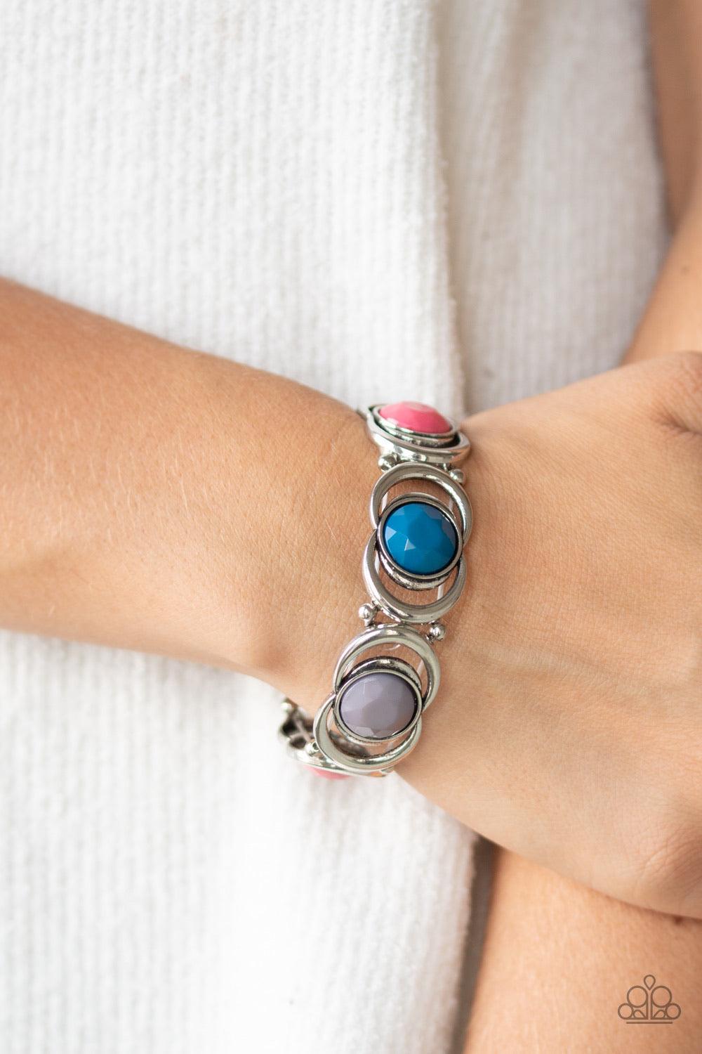 Paparazzi Accessories Modernly Malibu - Multi Faceted blue, pink, and gray beads are pressed into the center of interconnecting silver circles. Infused with dainty silver beads, the colorful frames are threaded along stretchy bands around the wrist for a