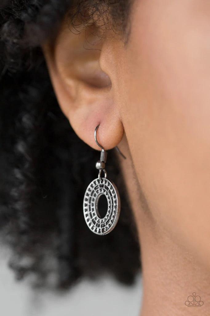 Paparazzi Accessories Basically Baltic - Black Radiating with circular details, airy oval frames link below the collar for a casual look. Features an adjustable clasp closure. Sold as one individual necklace. Includes one pair of matching earrings. Jewelr
