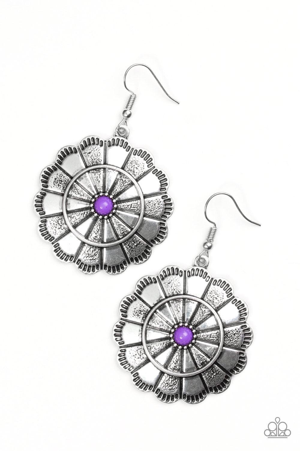 Paparazzi Accessories I’m No Wallflower - Purple Shimmery silver petals bloom from a vivacious purple center for a seasonal look. Etched in serrated edges, alternating petals have been delicately hammered in texture, adding depth and shimmer to the whimsi