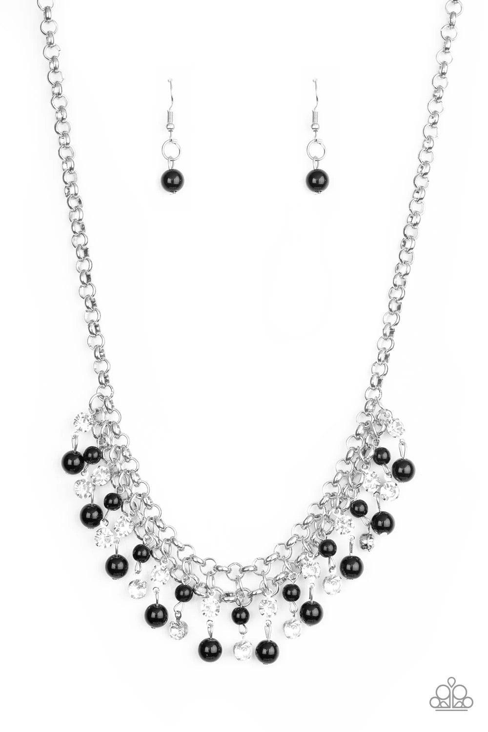 Paparazzi Accessories You May Kiss The Bride - Black Glittery white rhinestones and classic black beads swing from the bottom of interlocking silver chains, creating a bubbly fringe below the collar. Features an adjustable clasp closure. Sold as one indiv