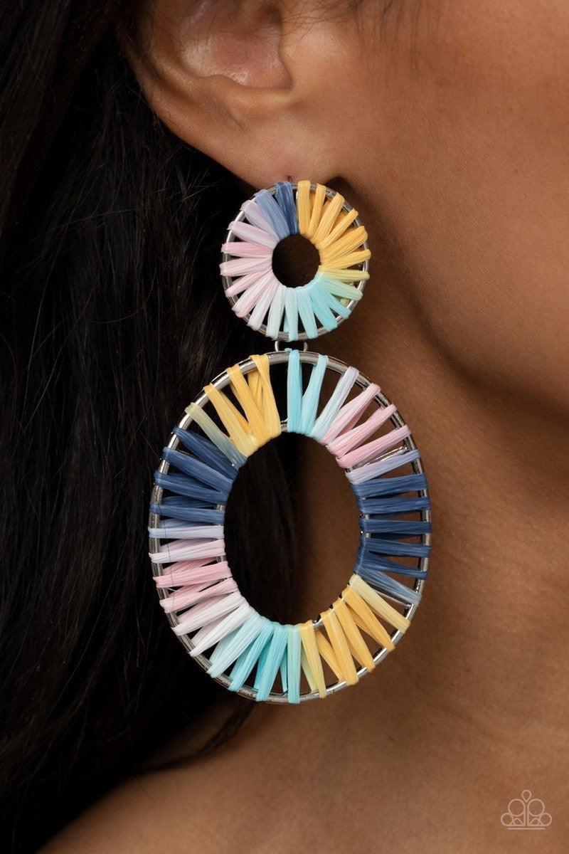 Paparazzi Accessories Foxy Flamenco - Multi Tie dyed wicker-like accents wrap around an oversized silver oval and dainty circular frame, linking into a colorful lure. Earring attaches to a standard post fitting. Sold as one pair of post earrings. Jewelry
