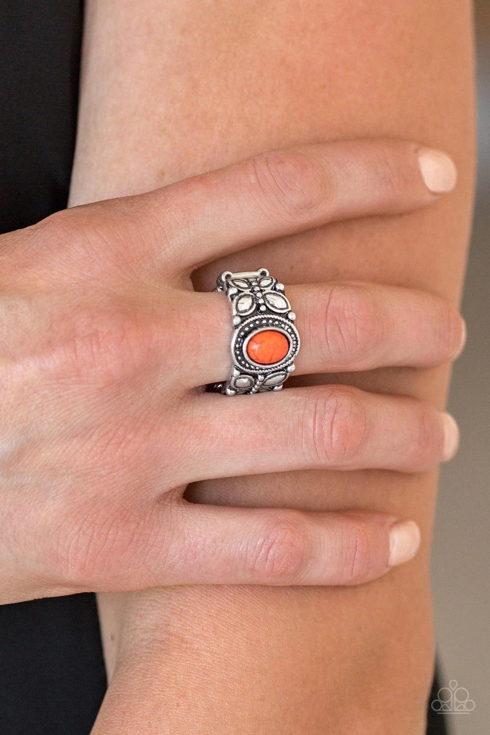 Paparazzi Accessories Butterfly Belle - Orange A refreshing orange stone is pressed into a shimmery silver band radiating with butterfly details for a whimsical look. Features a stretchy band for a flexible fit. Sold as one individual ring. Jewelry