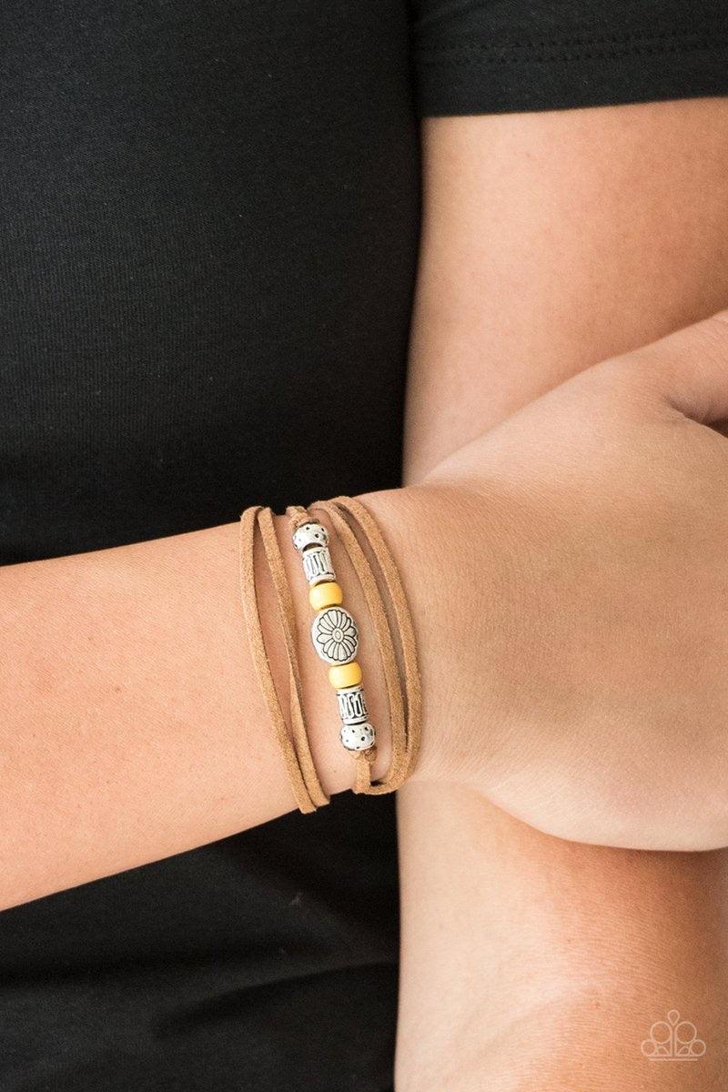 Paparazzi Accessories Clear A Path - Yellow An array of yellow and silver beads are knotted in place along elongated suede cording for a wanderlust fashion. To secure bracelet, tie ends in place around the wrist at desired length. Jewelry
