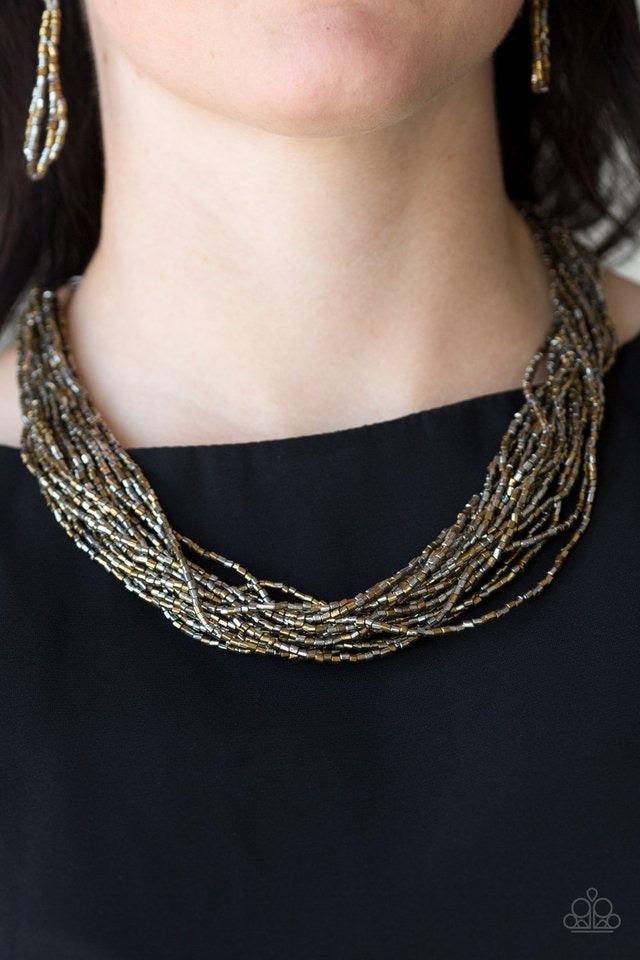 Paparazzi Accessories The Speed of STARLIGHT - Multi Stands of glistening brass and gunmetal seed beads subtlety twist below the collar, coalescing into a blinding shimmer. Features an adjustable clasp closure. Sold as one individual necklace. Includes on