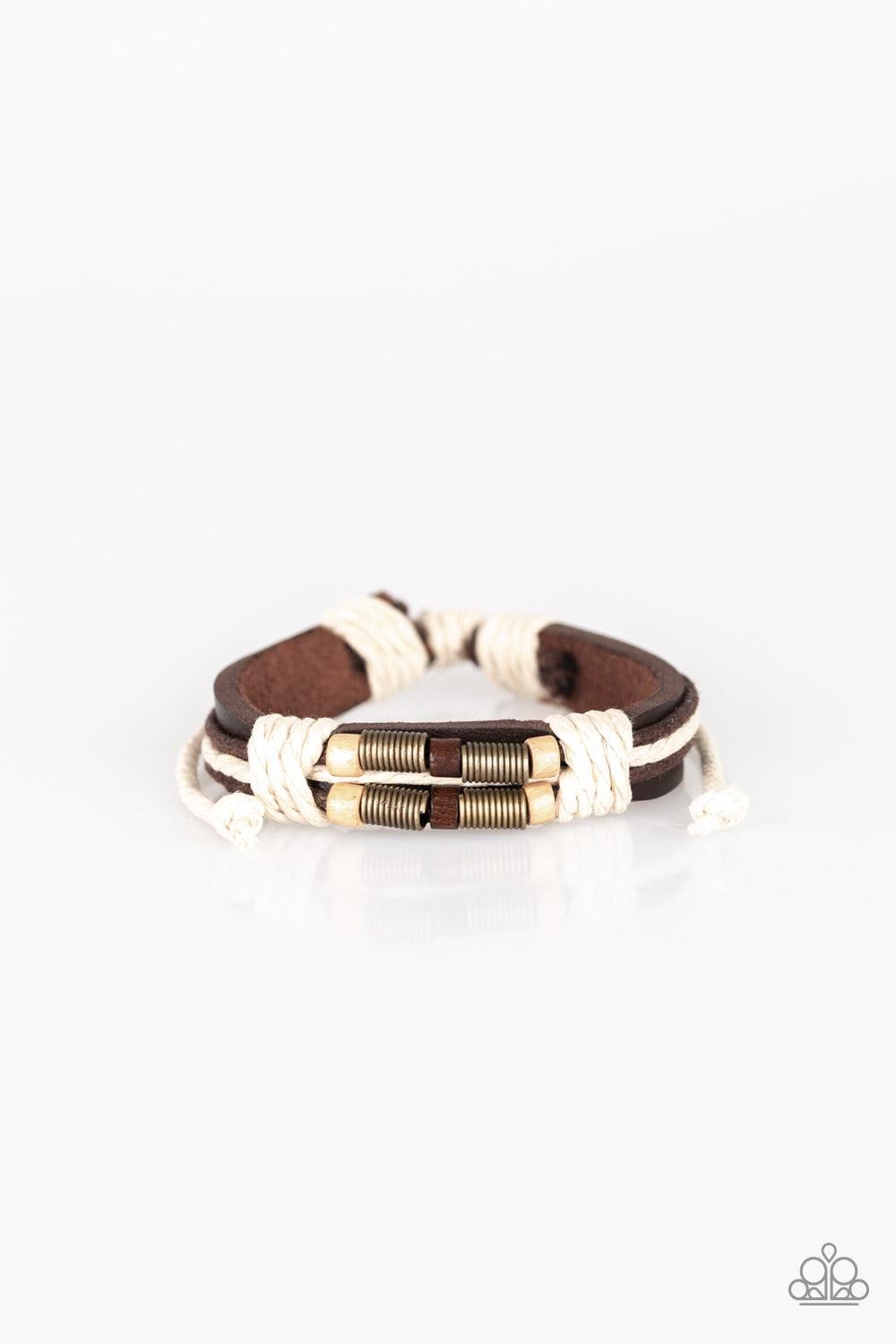Paparazzi Accessories Wonderfully Woodsy - Brown White twine knots wooden and brass beads along the front of a brown leather band, creating a seasonal centerpiece. Features an adjustable sliding knot closure. Jewelry