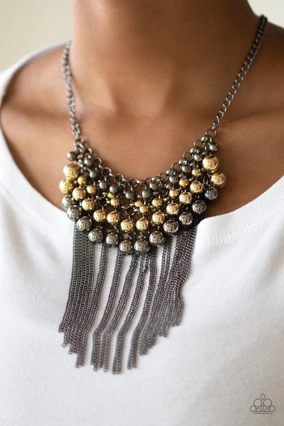 Paparazzi Accessories DIVA-de and Rule - Multi Gradually increasing in size, glistening gold and gunmetal beads swing from a net of interlocking gunmetal links. Shimmery gunmetal chains stream from the bottom of the beaded fringe for an edgy finish. Featu