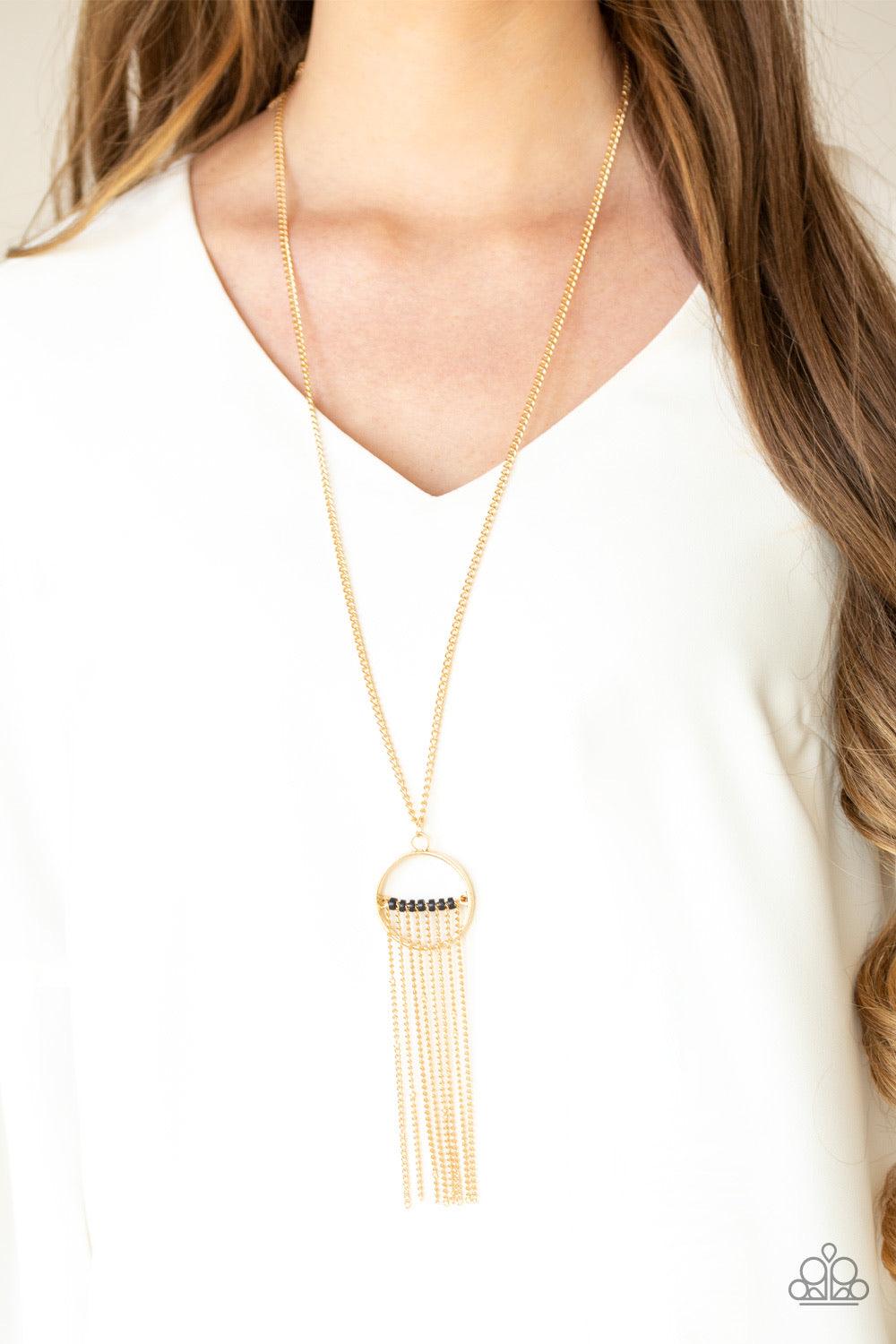 Paparazzi Accessories Terra Tassel - Gold Dainty pink pearls and sparkling white crystal-like bead gives way to two shimmery silver chain tassels. Infused with ornate silver beads, strands of matching beads trickle down the tassels for a refined flair. Fe