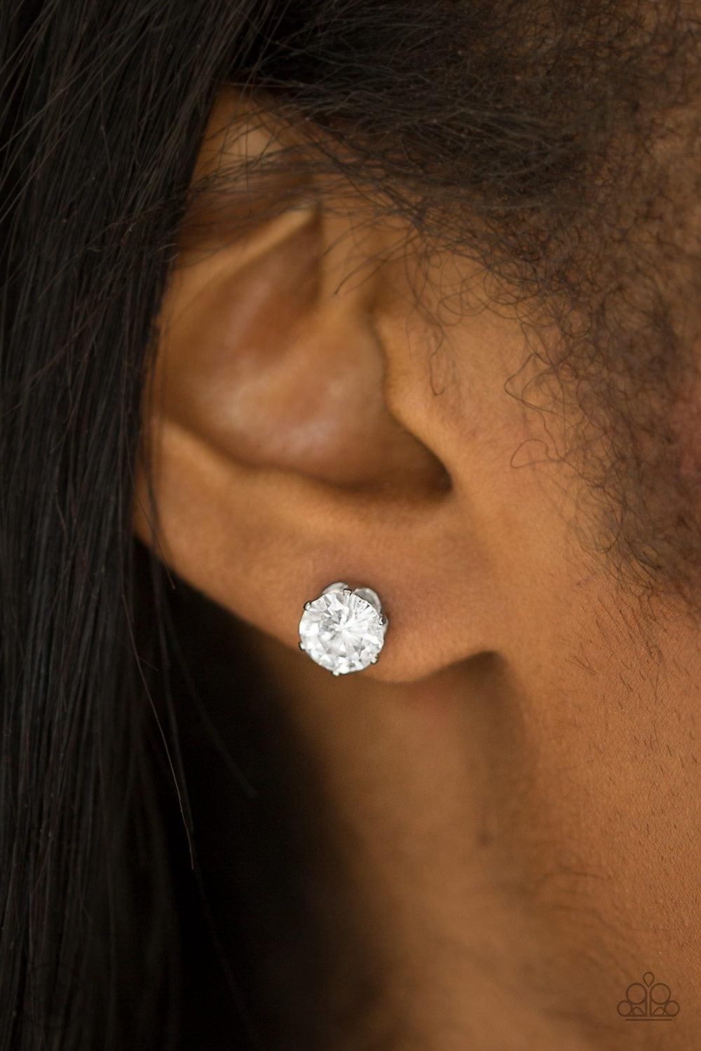Paparazzi Accessories Just In TIMELESS - White A sparkling white rhinestone is nestled inside a classic silver frame for a timeless look. Earring attaches to a standard post fitting. Jewelry