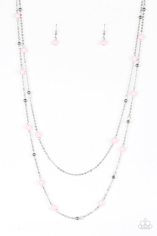 Paparazzi Accessories Beach Party Pageant - Pink Pretty pink and dainty silver beads trickle along two shimmery silver chains, creating colorful layers down the chest. Features an adjustable clasp closure. Sold as one individual necklace. Includes one pai