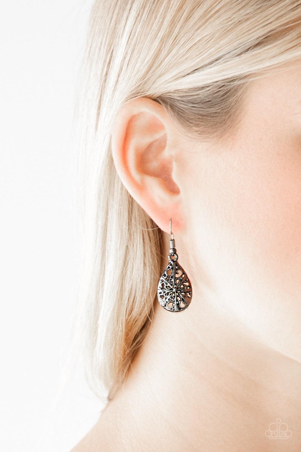 Paparazzi Accessories Western Wisteria - Black Shimmery gunmetal filigree joins into a dainty teardrop frame for a whimsical look. Earring attaches to a standard fishhook fitting. Jewelry