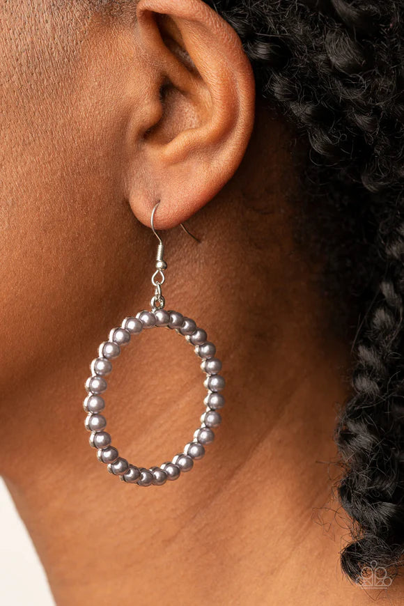 Paparazzi Accessories Can I Get a Hallelujah - Silver A trio of oversized white rhinestones haphazardly adorns layers of mismatched rows of dainty white rhinestones and antiqued silver bands, coalescing into a knockout centerpiece. Features a stretchy ban