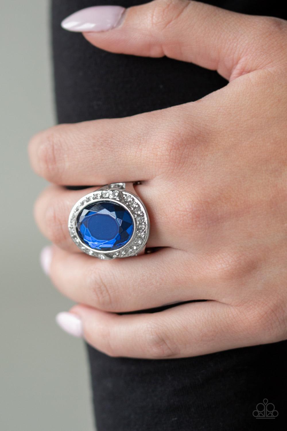 Paparazzi Accessories Queen Scene - Blue Varying in size, row after row of glittery hematite rhinestones are encrusted along studded silver bands for a dazzling look. Features a stretchy band for a flexible fit. Jewelry