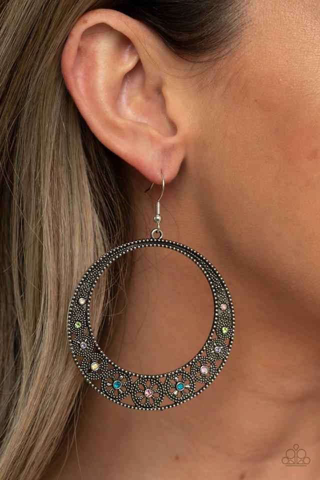 Paparazzi Accessories Bodaciously Blooming - Multi Dotted with dainty multicolored rhinestones, studded wheel-like frames connect into a studded hoop for a whimsical look. Earring attaches to a standard fishhook fitting. Sold as one pair of earrings. Jewe