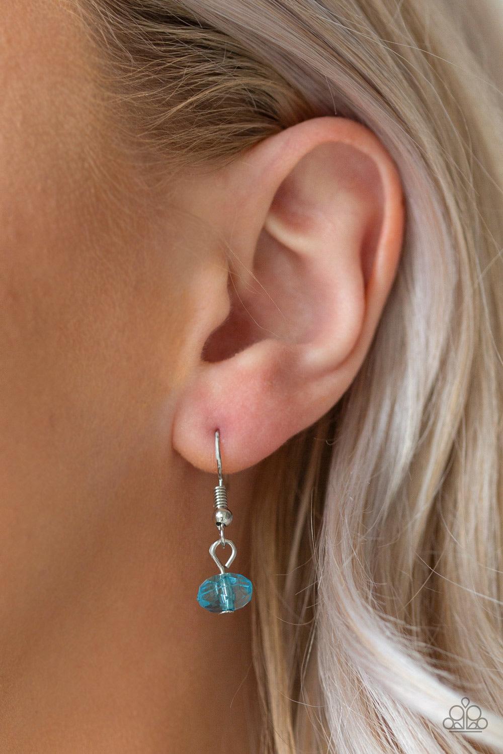 Paparazzi Accessories I Want to SEA the Word - Blue A collection of blue shell-like beads, blue crystal-like beads, and shiny silver beads swing from a bold silver chain, creating a whimsical fringe below the collar. Features an adjustable clasp closure.