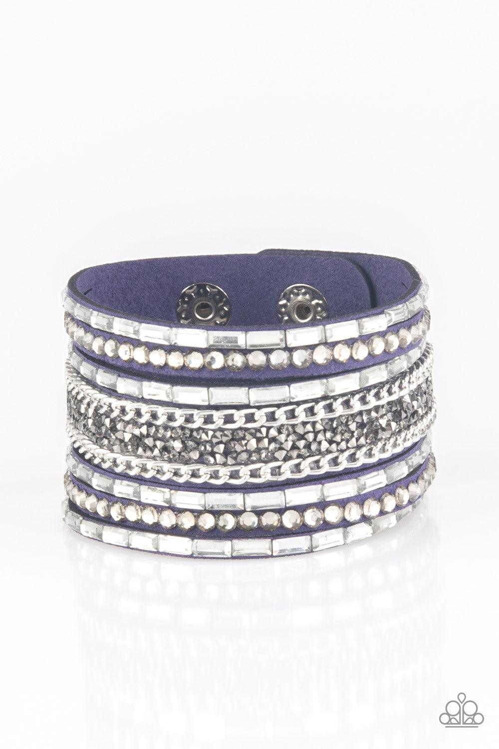 Paparazzi Accessories Rhinestone Rumble - Blue White emerald-cut rhinestones, smoky round rhinestones, and metallic prism-shaped rhinestones are sprinkled along strands of blue suede. Shimmery silver chain is added to the mix for a sassy industrial finish
