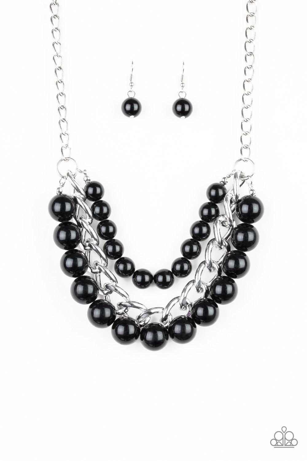 Paparazzi Accessories Empire State Empress - Black Two strands of dramatic black beads flank one strand of oversized silver chain, creating statement-making layers below the collar. Features an adjustable clasp closure. Sold as one individual necklace. In