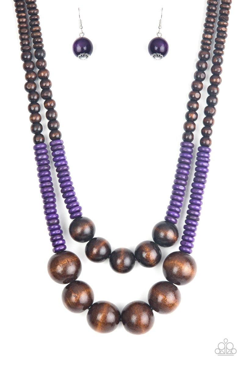 Paparazzi Accessories Cancun Cast Away - Purple Earthy brown and vivacious purple wooden beads and discs are threaded along shiny strands of brown cording, creating colorful layers. Features a button loop closure. Jewelry