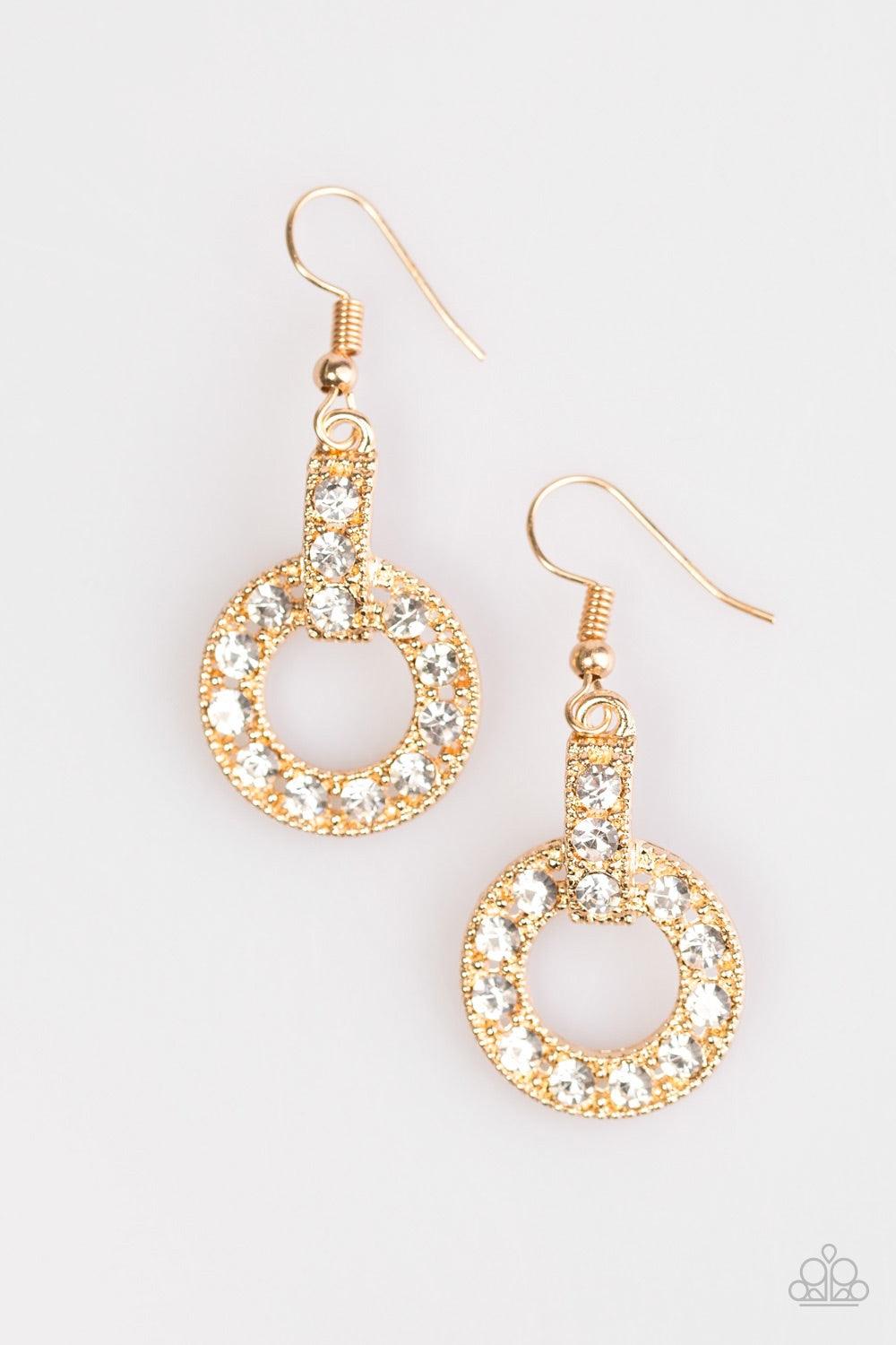 Paparazzi Accessories Midnight Ball - Gold Glittery white rhinestones are encrusted along a shimmery gold hoop and frame, creating an elegant lure. Earring attaches to a standard fishhook fitting. Jewelry