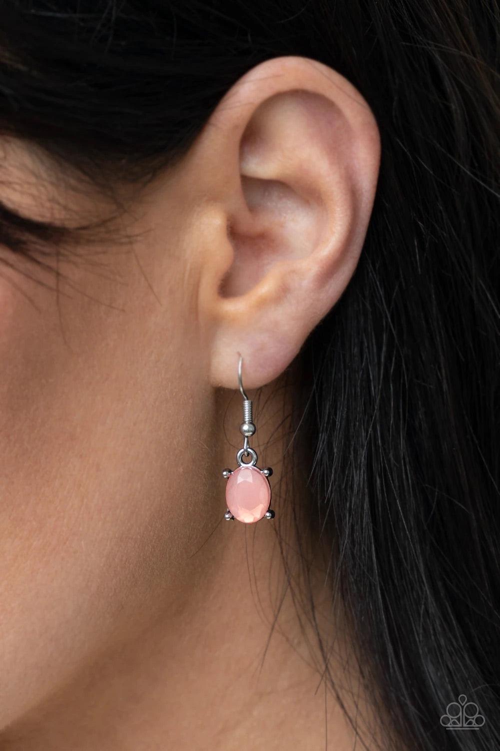 Paparazzi Accessories Ethereal Romance - Orange Varying in opacity and shape, mismatched pink beads attach to oversized white rhinestones, creating bubbly frames that delicately link into an ethereal display below the collar. Features an adjustable clasp