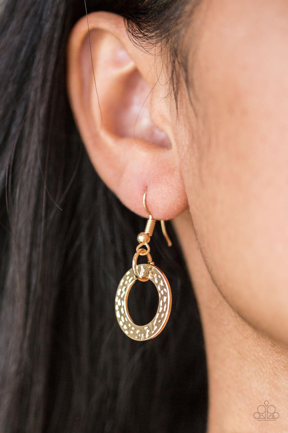 Paparazzi Accessories Treasure Tease - Gold Brushed in a high-sheen shimmer, delicately hammered gold discs connect below the collar for a bold industrial look. Features an adjustable clasp closure. Jewelry