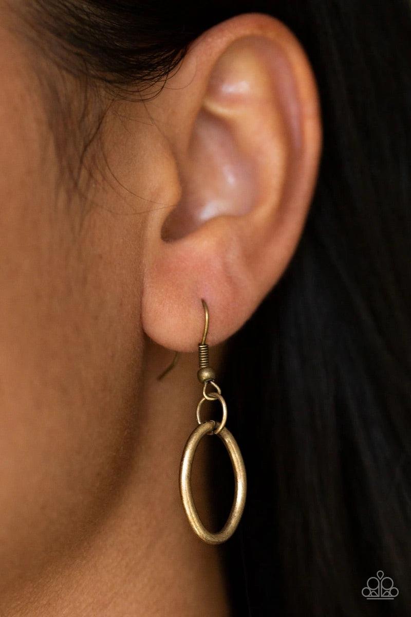 Paparazzi Accessories Perfect MISMATCH - Brass An array of smooth and textured brass hoops connect across the chest, creating a bold mismatched palette. Features an adjustable clasp closure. Sold as one individual necklace. Includes one pair of matching e