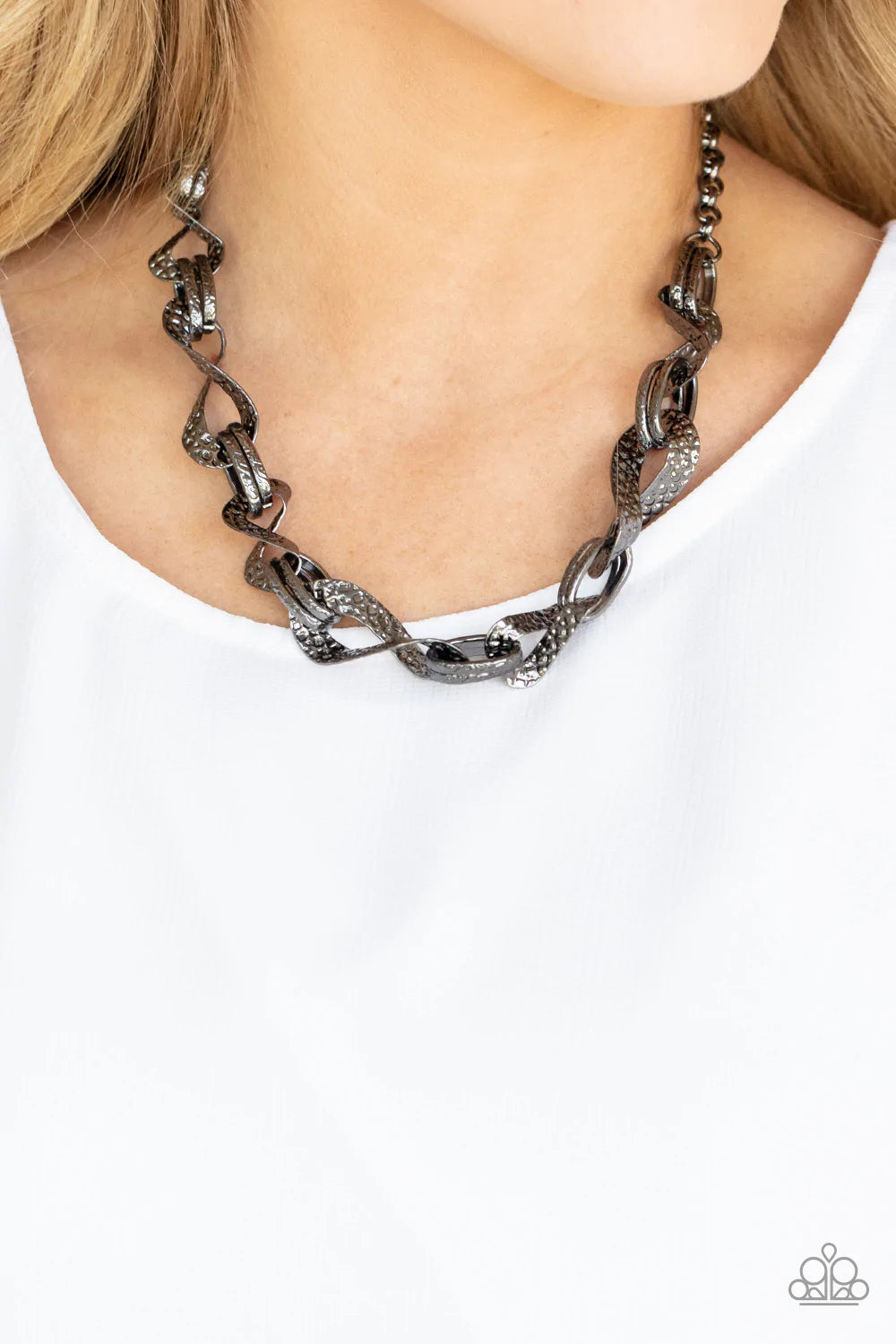Paparazzi Accessories METAL of Honor - Black Hammered and embossed in geometric detail, pairs of gunmetal links connect with twisting gunmetal oval fames below the collar for an edgy, but refined look. Features an adjustable clasp closure. Sold as one ind