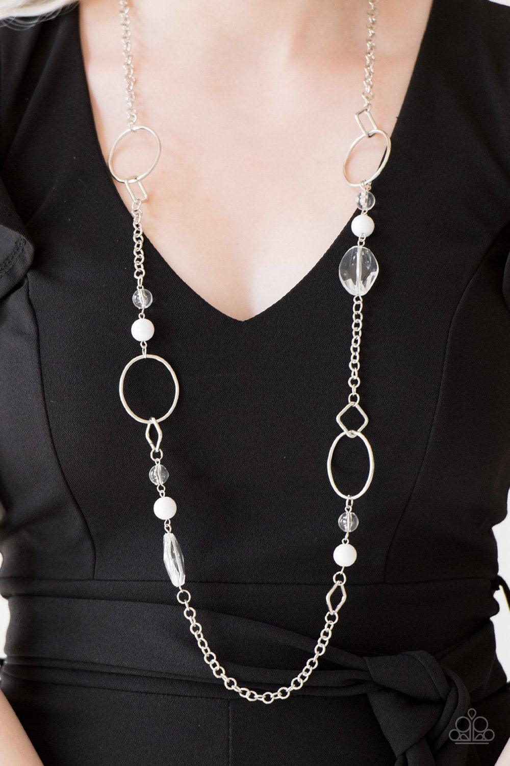 Paparazzi Accessories Very Visionary - White Polished and glassy white beads trickle along a shimmery silver chain featuring round and square frames for a seasonal look. Features an adjustable clasp closure. Sold as one individual necklace. Includes one p