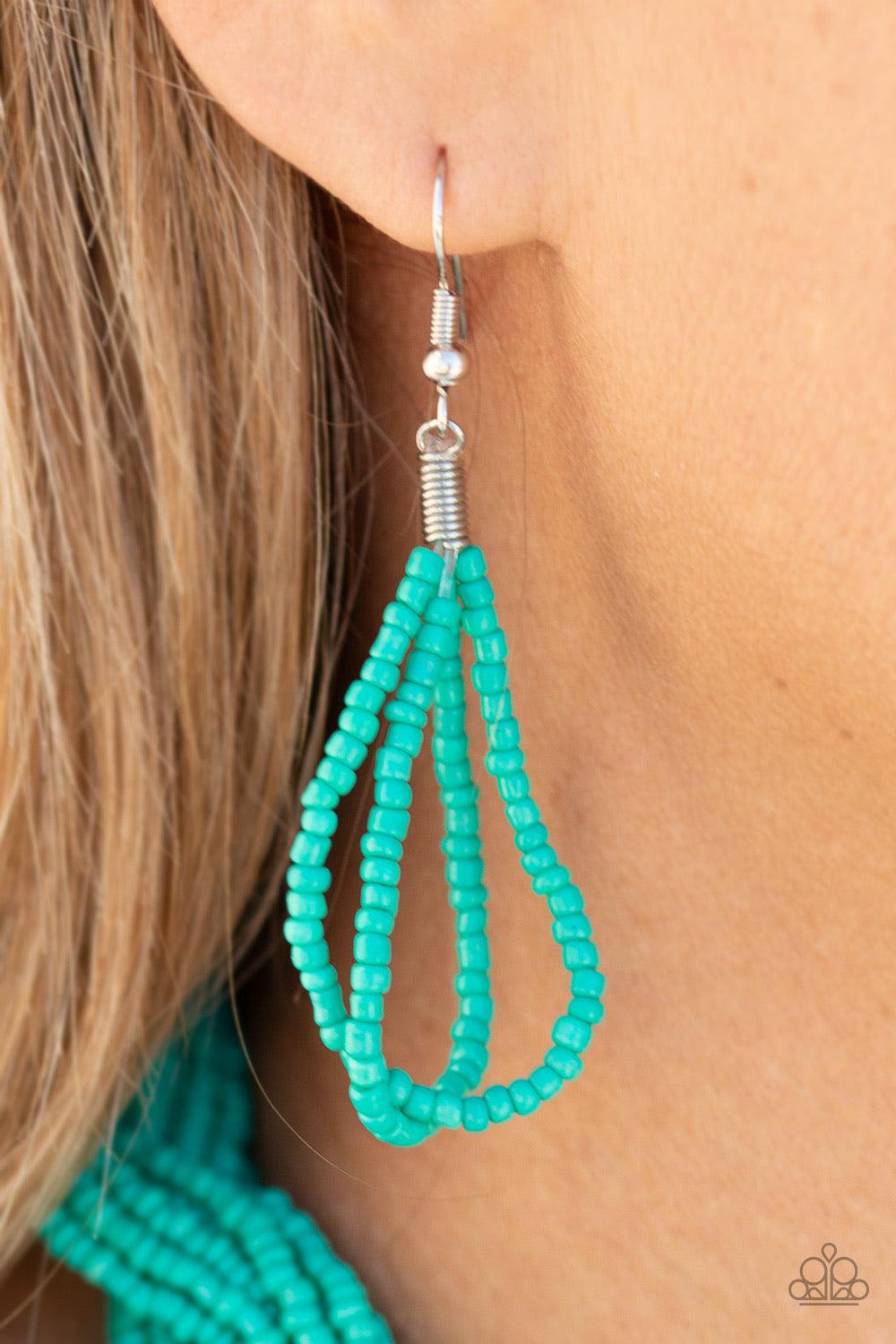 Paparazzi Accessories A Standing Ovation - Blue Countless strands of turquoise seed beads are twisted and knotted together to create an unforgettable statement piece. Features an adjustable clasp closure. Sold as one individual necklace. Includes one pair