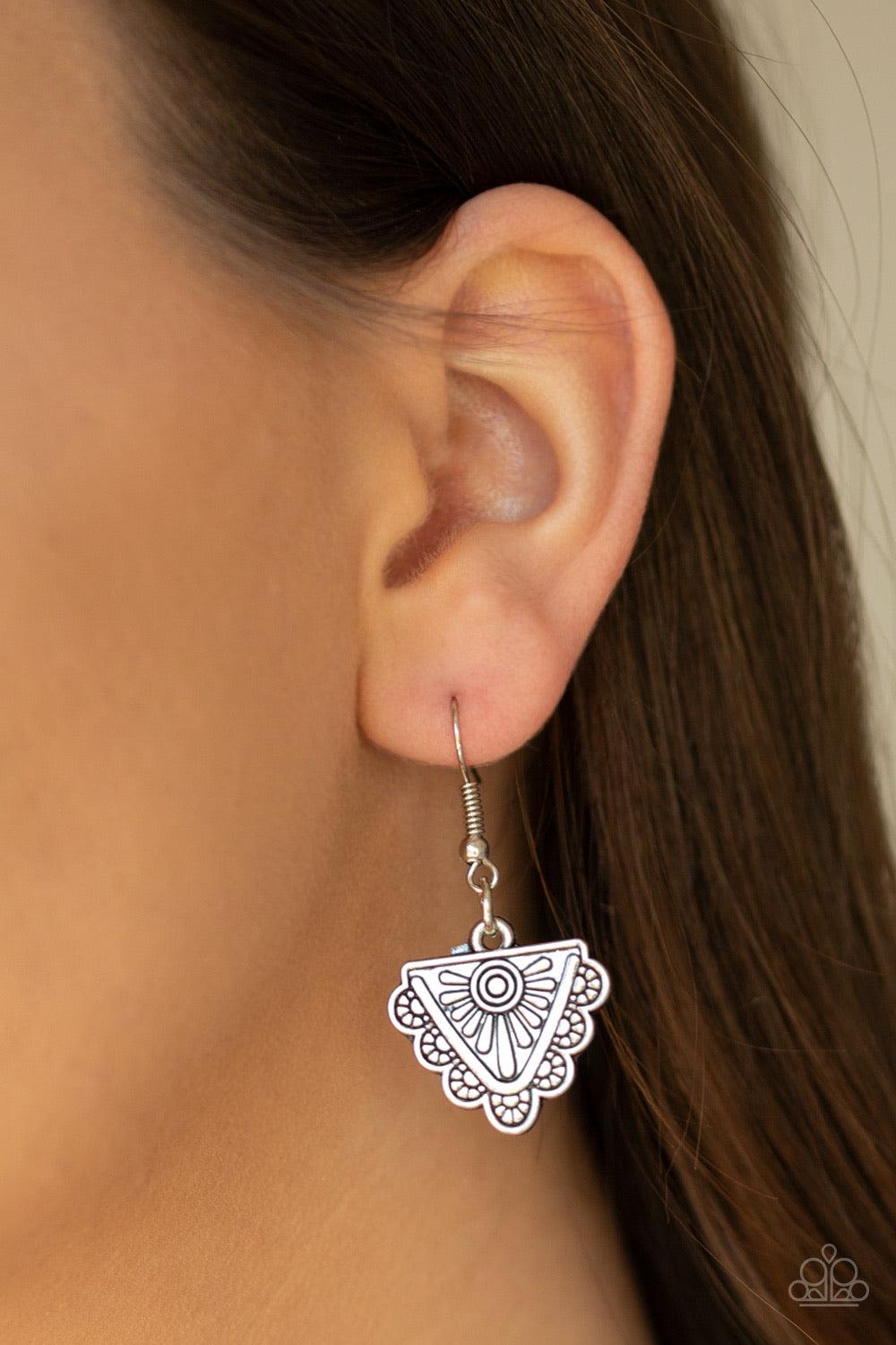 Paparazzi Accessories Might And Mane - Orange A plume of shiny orange thread flares out from the bottom of a silver half-moon frame stamped in tribal inspired patterns, creating a fierce fringe below the collar. Features an adjustable clasp closure. Jewel