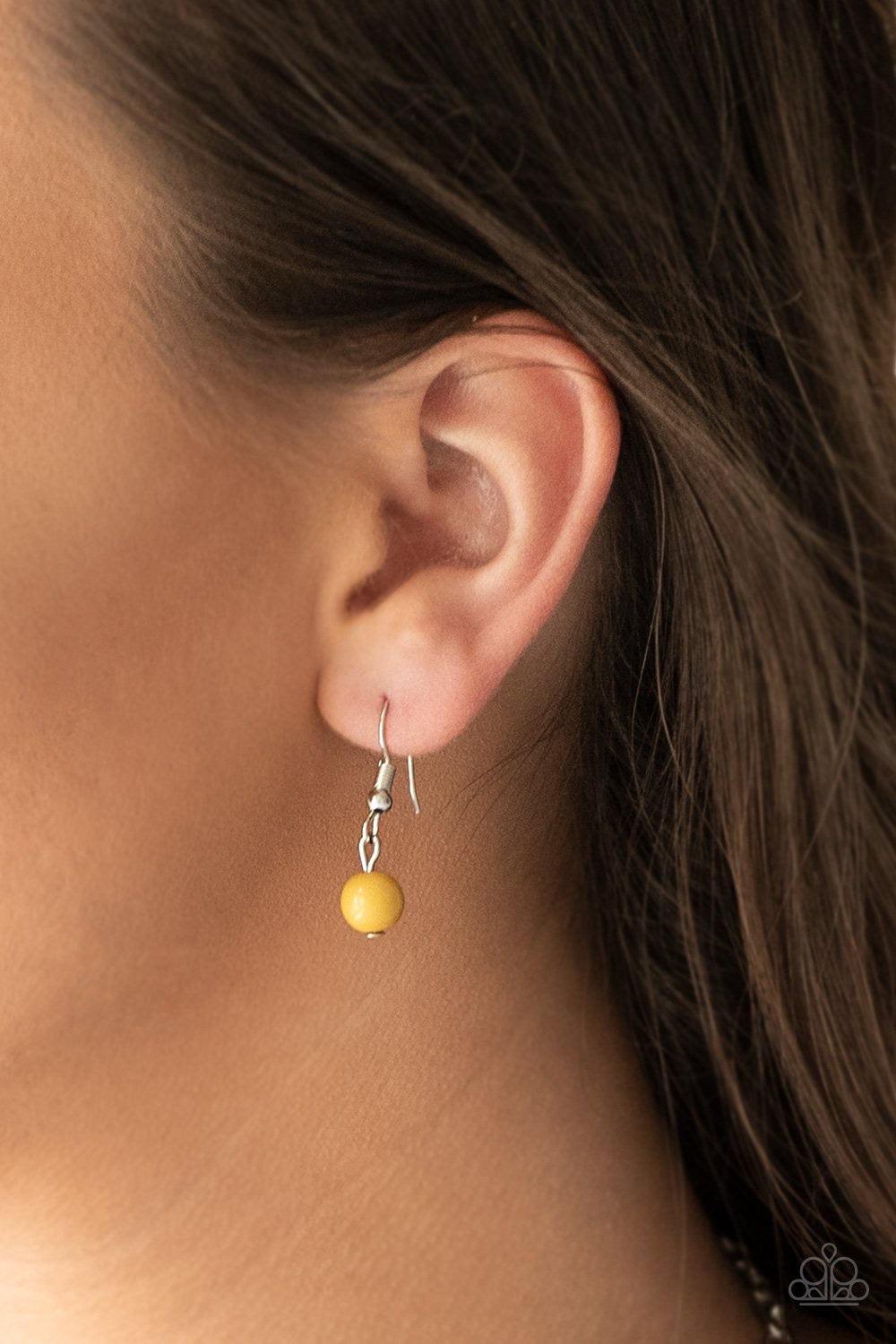 Paparazzi Accessories Flirty Foxtrot - Yellow Smooth and hammered silver rings join clusters of yellow beads along a shimmery silver chain for a colorful look. Features an adjustable clasp closure. Jewelry