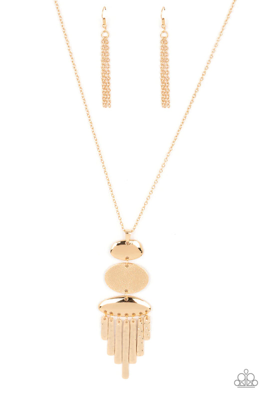 Paparazzi Accessories After the ARTIFACT - Gold A hammered gold oval frame is flanked between two asymmetrical gold frames at the bottom of a lengthened gold chain. Hammered gold pendulums swing from the bottom of the stacked pendant, adding playful movem