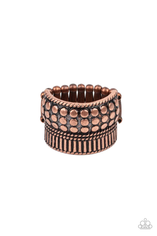 Paparazzi Accessories Tenacious Texture - Copper Infused with dainty bands of twisted ropelike texture, a beveled copper frame embossed in flattened copper studs is topped by an engraved band of linear texture for a collisional fashion. Features a stretch