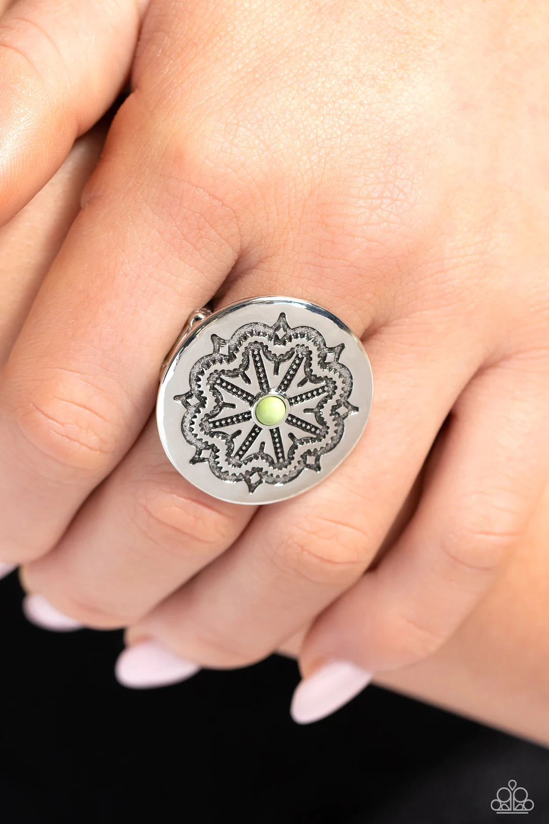 Paparazzi Accessories Carved Coachella - Green Stamped in botanical filigree, a flat, glistening, silver disc displays an earthy apple green stone center around its dancing texture for a seasonal look. Features a stretchy band for a flexible fit. As the s