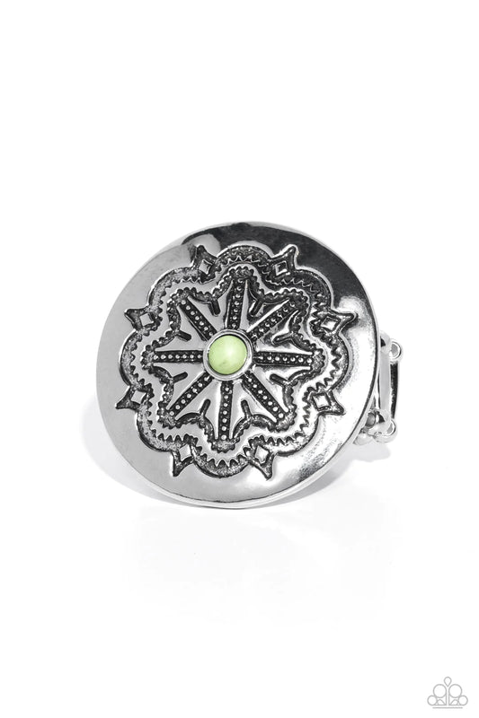 Paparazzi Accessories Carved Coachella - Green Stamped in botanical filigree, a flat, glistening, silver disc displays an earthy apple green stone center around its dancing texture for a seasonal look. Features a stretchy band for a flexible fit. As the s