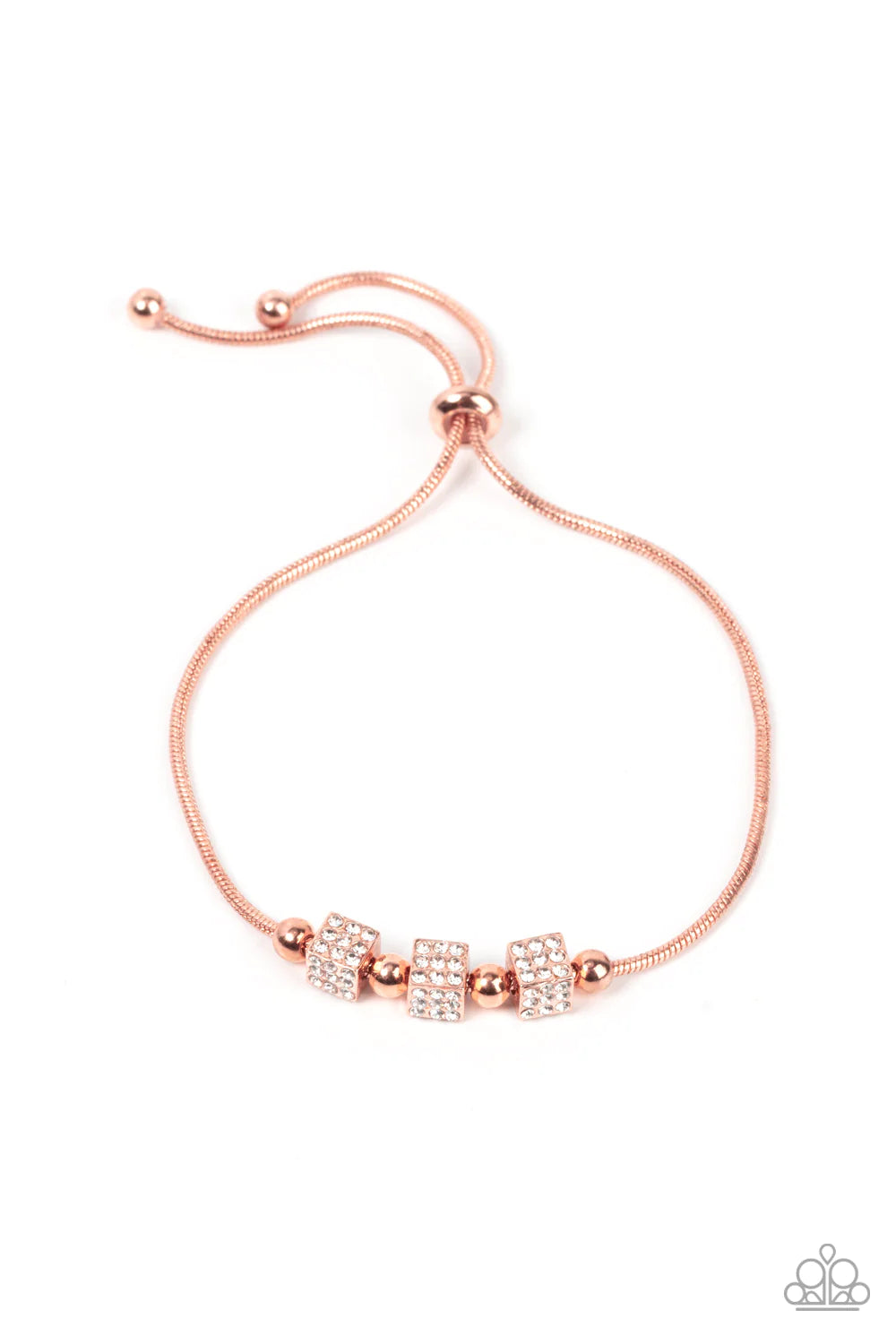 Paparazzi Accessories Roll Out the Radiance - Copper Dainty shiny copper beads and white rhinestone encrusted shiny copper cubes slide along a rounded shiny copper snake chain around the wrist, resulting in a radiant centerpiece. Features an adjustable sl
